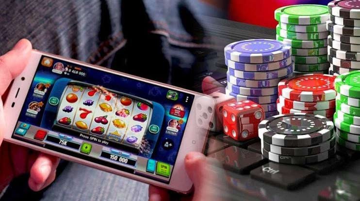 77bet players enjoying mobile casino games on their phones in the Philippines